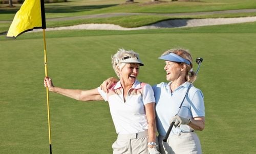 Retired women playing golf