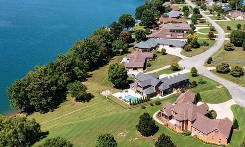 Aerial view of lakefront luxury family homes at Shasteen Bend on Tims Ford Lake in Tennessee